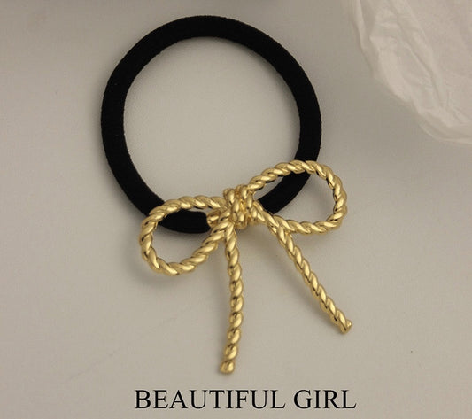 Twisted Bow Statement Metal Hair Tie