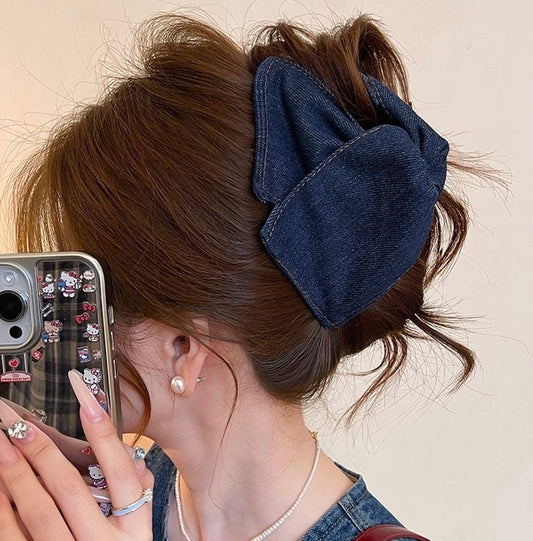 She’s got good genes! Denim Hair Claw