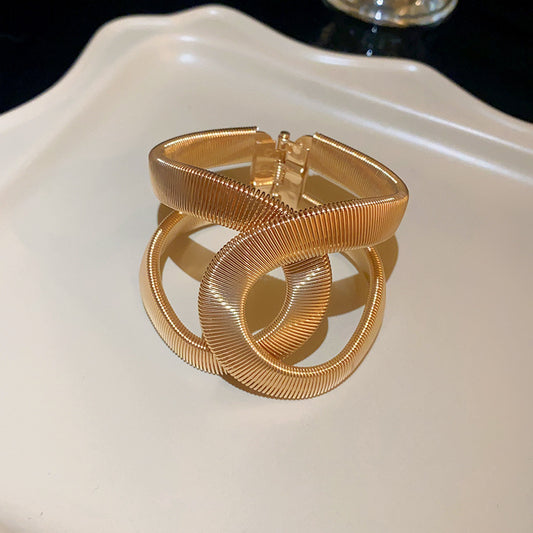 She’s curvy! Gold Handcuff