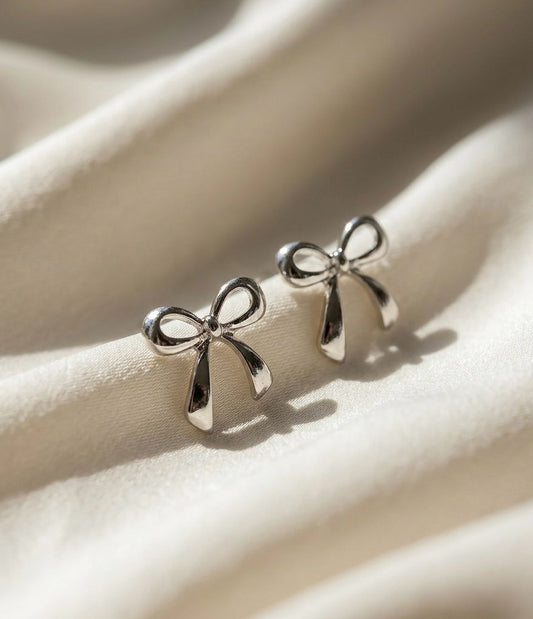 IT Bow Energy Earrings