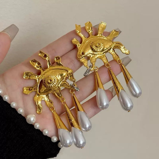 Gilded Gaze Statement Earrings