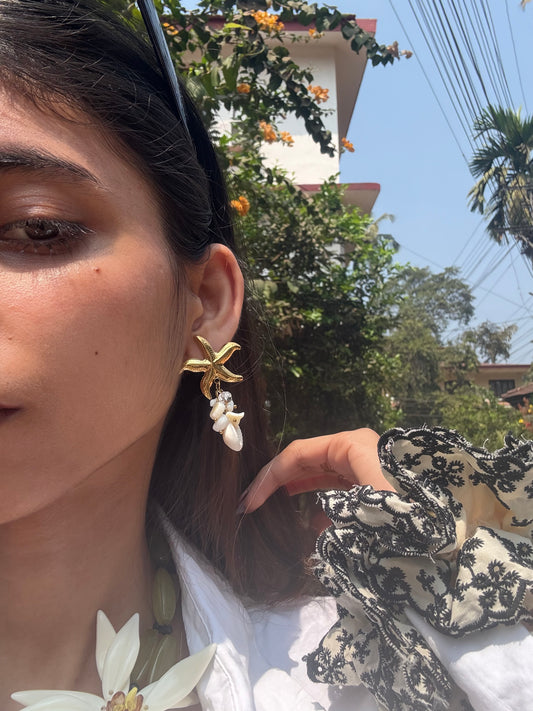 Catch her on Coast Earrings