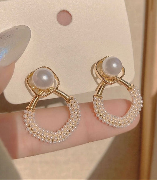 The elegance of Pearl statement Korean earrings