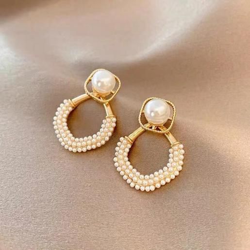 The elegance of Pearl statement Korean earrings