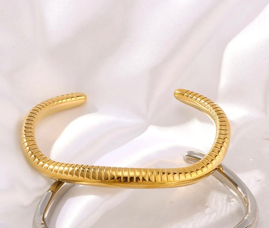 Vogue-coded Gold Bracelet