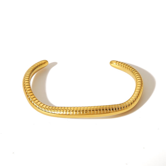Vogue-coded Gold Bracelet