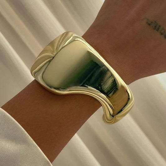 Scooped Golden Handcuff