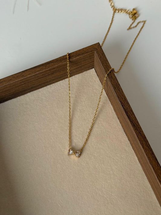 Bow Whisper Necklace