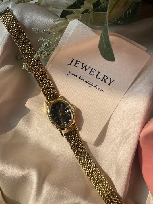 Luxurious Legacy Gold Band Watch